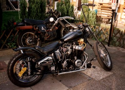 Shiny new bike with a rusted XT in the back