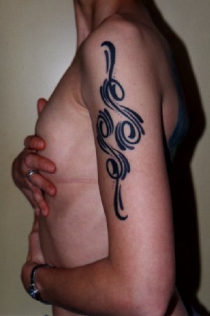 tribaldesign on her left arm